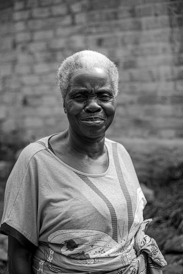 Grayscale Photo of an Elderly Woman