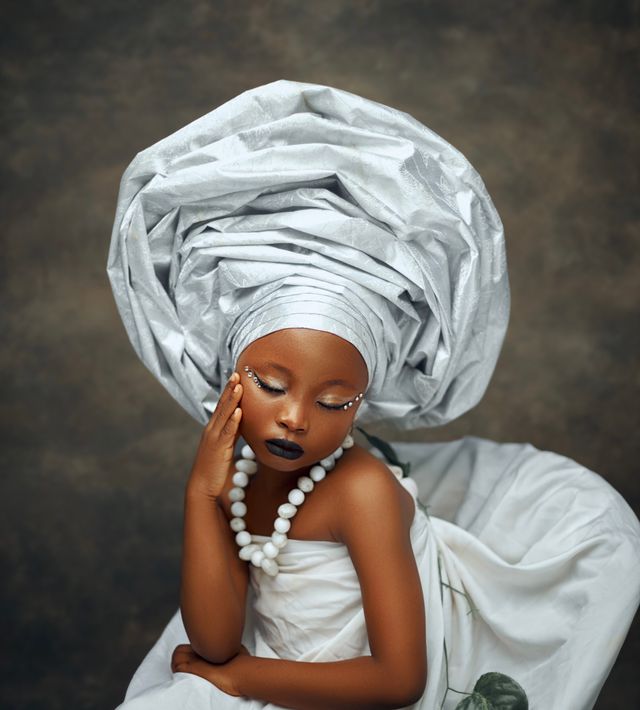 Young Model in Traditional African Gele Headwrap