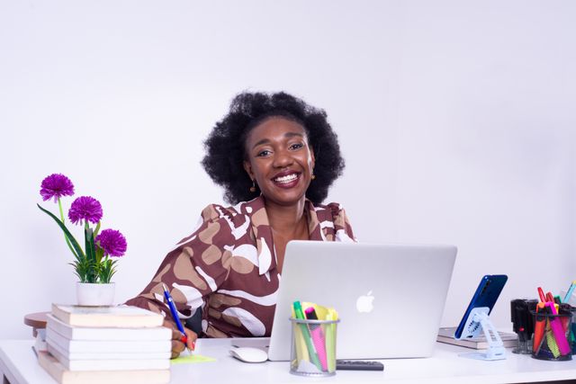 Smiling African Businesswoman in Office Setting