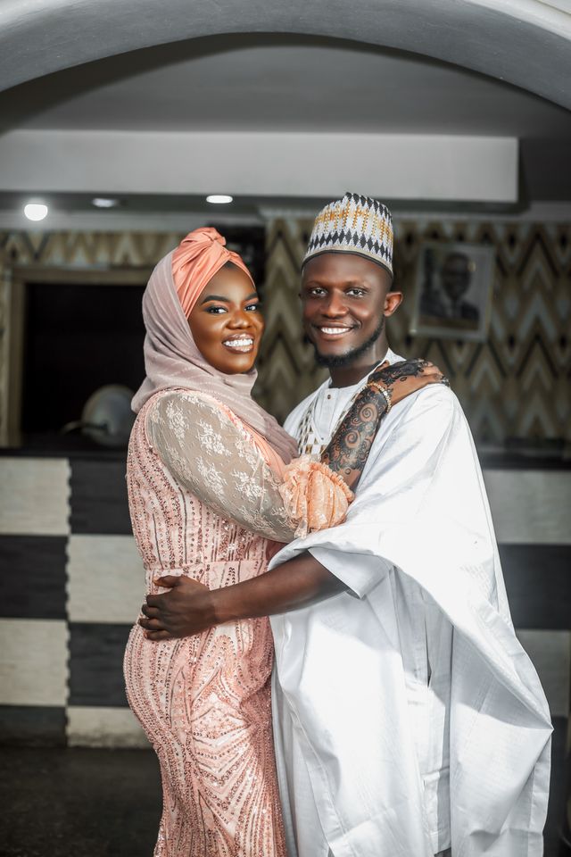 Nigerian Couple in Traditional Attire Smiling