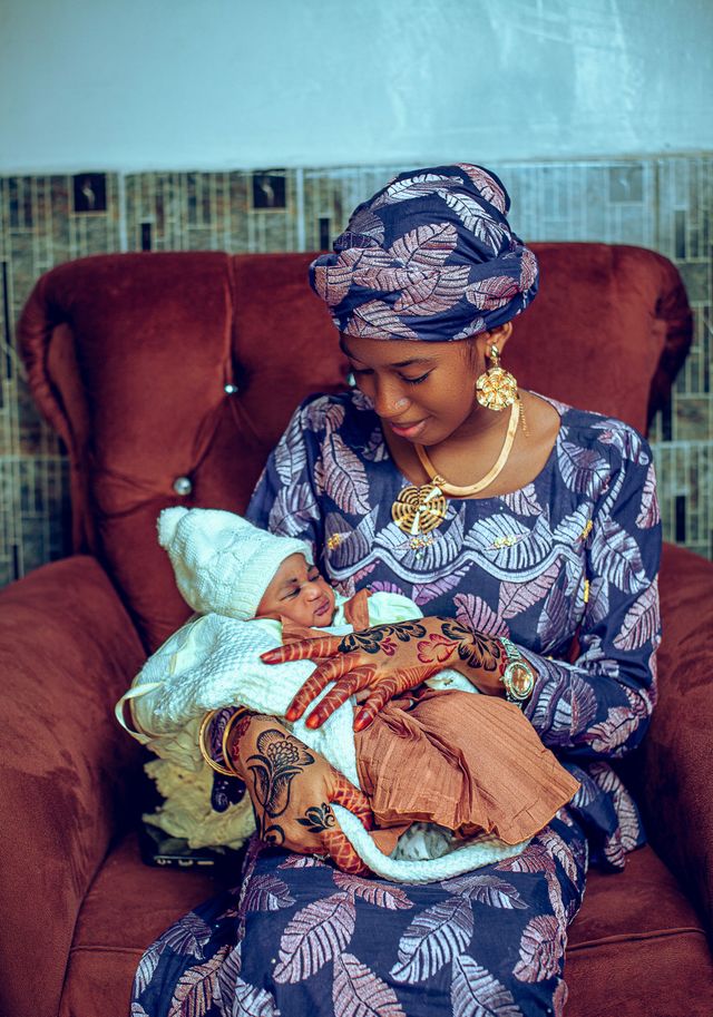 Mother with Newborn in Traditional African Dress