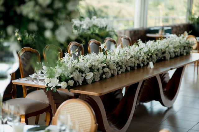 Elegant Wedding Table with Floral Arrangement
