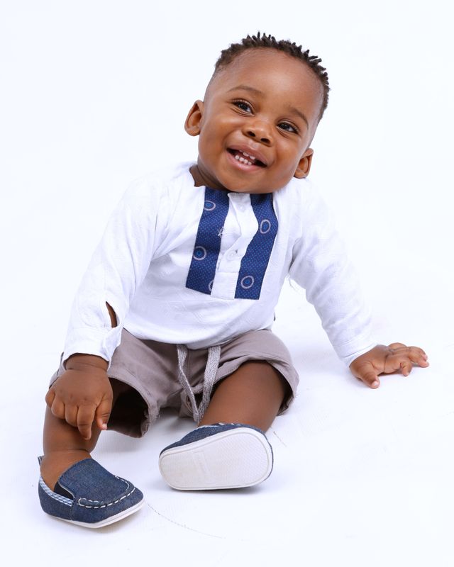Portrait of Cute Toddler on White Background