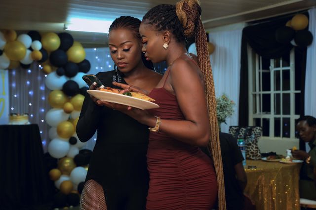 Two Women Looking the Smartphone Together